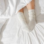 Does sleeping with socks actually help you fall asleep faster? Here's what the doctors say