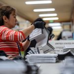 Federal judge blocks Trump admin from threatening election workers