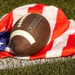 Oregon school officials remain silent after football player knocks out opponent carrying American flag