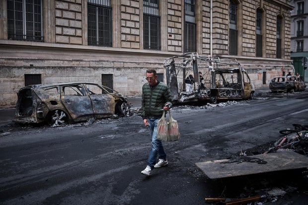 French leaders pledge to restore order after weekend of violent riots across the country
