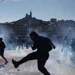 Clashes between police and protesters during large demonstrations across France