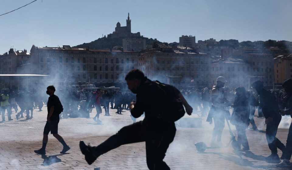 Clashes between police and protesters during large demonstrations across France