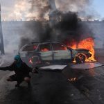 French police arrest 855 people in Paris as protests erupt and violence erupts across the country