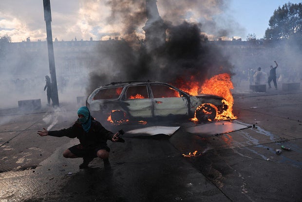 French police arrest 855 people in Paris as protests erupt and violence erupts across the country