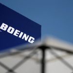 Live earnings updates: Boeing shares fall amid mixed third-quarter turnaround, SoFi rises