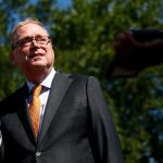 Trump aide Hassett says Powell should 'leave' Fed board