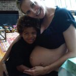 Pregnant Heidi Klum shows off her bare baby bump in never-before-seen photos