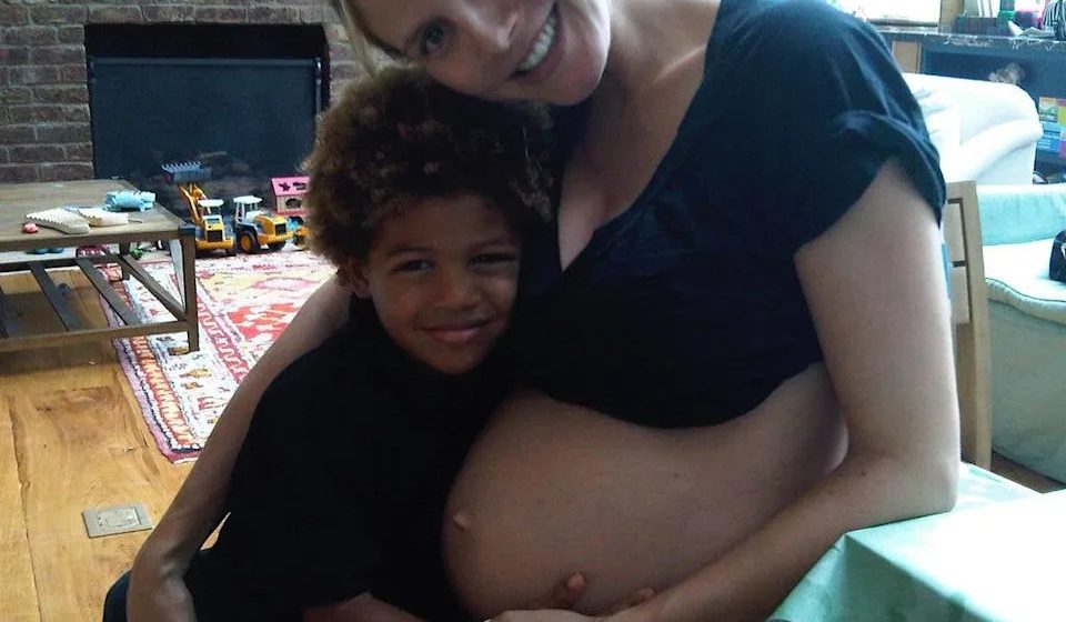 Pregnant Heidi Klum shows off her bare baby bump in never-before-seen photos
