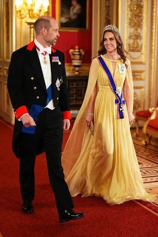 Kate Middleton makes a dramatic entrance in a yellow dress for a rare tiara moment at the state banquet