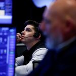 Wall Street ends lower as Alphabet's shortfall rekindles AI investment jitters