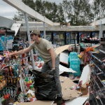 Photos of hurricane damage show flooding, debris and cleanup efforts