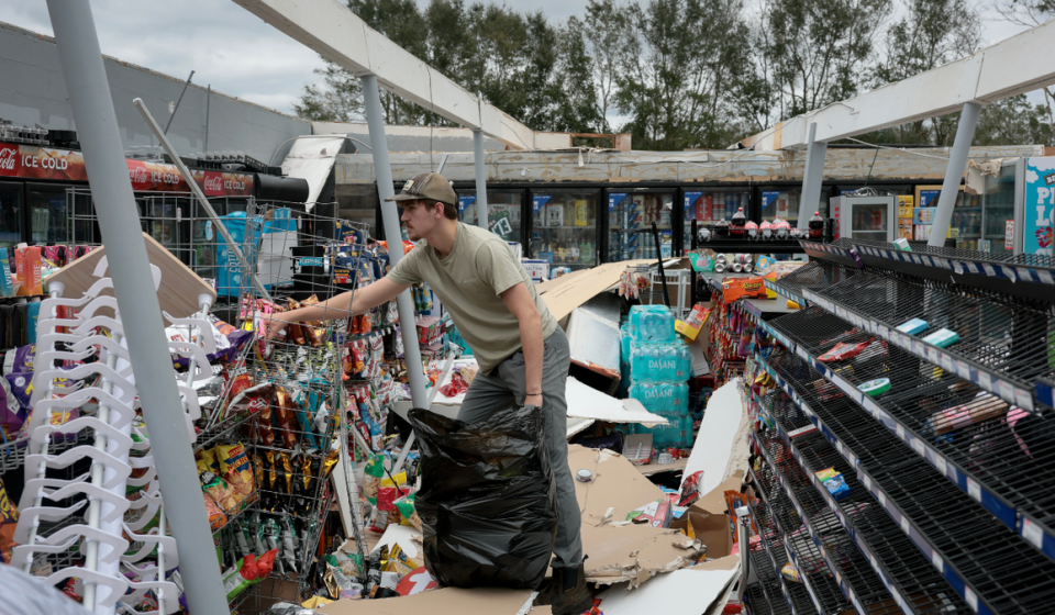Photos of hurricane damage show flooding, debris and cleanup efforts