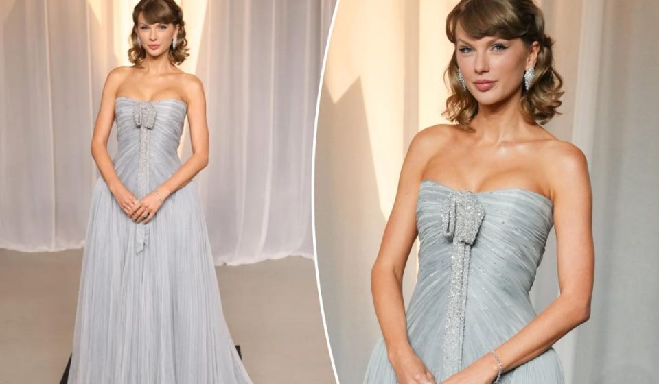 Taylor Swift wears a blue Dior ballgown on the red carpet at the 2026 Academy Museum Gala