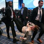 Pete Hegseth called war criminal by protesters at Army drone panel