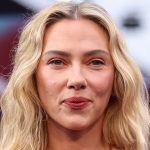 Scarlett Johansson shows off back tattoos in sizzling strapless dress