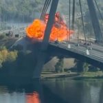 Russian drone crashes into kyiv bridge in campaign that intensifies as German Chancellor arrives to sirens and explosions