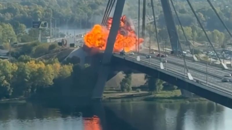 Russian drone crashes into kyiv bridge in campaign that intensifies as German Chancellor arrives to sirens and explosions