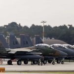 Up First briefing: British base; The schools of France; August Hanning; October 7: NPR