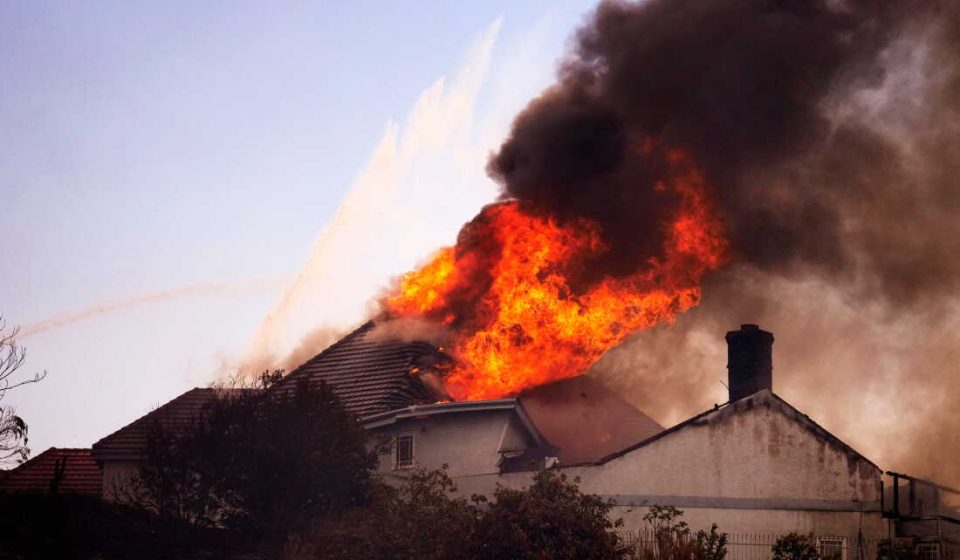 Coastal homes burn as hot winds fuel California fires: NPR