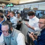 US stocks near their latest record in mixed trading on Wall Street