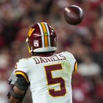 Dan Quinn tells Jayden Daniels to 'shoot' even though there's a penalty flag on the field