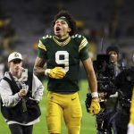 Christian Watson coughed up blood, broke a rib, went to the hospital and returned to the game