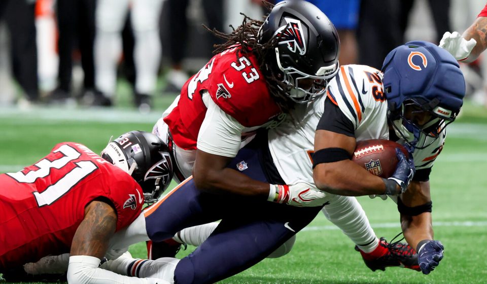 Falcons LB Kendal Daniels removed from the field on a stretcher