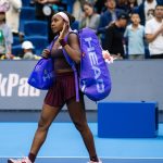 An exhausted Coco Gauff falls to Elise Mertens at the China Open days after being the victim of racist abuse