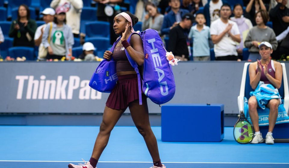An exhausted Coco Gauff falls to Elise Mertens at the China Open days after being the victim of racist abuse