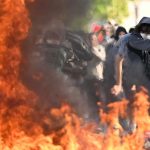 Student protests in France have spread from Paris, with violent clashes forcing hundreds of high schools to close