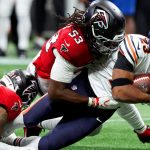 Falcons LB Kendal Daniels removed from the field on a stretcher